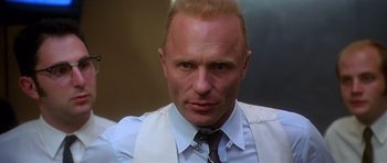 Movie still from “Apollo 13” (1995), directed by Ron Howard – A man in a white shirt and a black tie; Close Up shot, Low angle