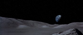 Movie still from “Apollo 13” (1995), directed by Ron Howard – An image of an earth from the side of the moon; Extreme Wide shot, High angle