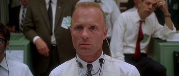 Movie still from “Apollo 13” (1995), directed by Ron Howard – A man in a white shirt and a tie; Close Up shot, Low angle