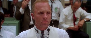 Movie still from “Apollo 13” (1995), directed by Ron Howard – A man that is wearing a white shirt and a tie; Close Up shot, Low angle