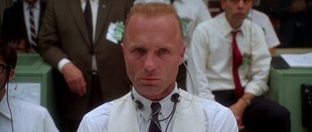 Movie still from “Apollo 13” (1995), directed by Ron Howard – A man in a white shirt and a tie; Close Up shot, Low angle