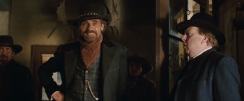 Movie still from “Appaloosa” (2008), directed by Ed Harris – A man and a woman dressed in western clothing; Medium shot, Over the shoulder angle