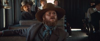 Movie still from “Appaloosa” (2008), directed by Ed Harris – A man with a beard wearing a brown hat; Close Up shot, Low angle