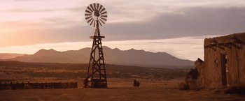 Movie still from “Appaloosa” (2008), directed by Ed Harris – An old windmill in the middle of the desert; Extreme Wide shot, Low angle