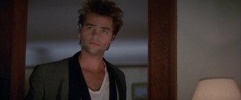 Movie still from “April Fool's Day” (1986), directed by Fred Walton – A person wearing a jacket; Close Up shot, Low angle