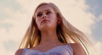 Movie still from “Aquamarine” (2006), directed by Elizabeth Allen Rosenbaum – A beautiful blond woman with long hair in the wind; Close Up shot, Low angle