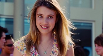 Movie still from “Aquamarine” (2006), directed by Elizabeth Allen Rosenbaum – A young woman with long blonde hair wearing a necklace; Close Up shot, Over the shoulder angle