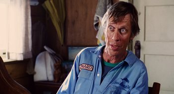 Movie still from “Aquamarine” (2006), directed by Elizabeth Allen Rosenbaum – A person wearing a blue shirt; Close Up shot, Over the shoulder angle