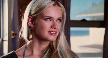 Movie still from “Aquamarine” (2006), directed by Elizabeth Allen Rosenbaum – A woman with blonde hair and blue streaks in her hair; Close Up shot, Over the shoulder angle
