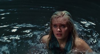 Movie still from “Aquamarine” (2006), directed by Elizabeth Allen Rosenbaum – A woman in the water with long blonde hair; Close Up shot, High angle
