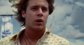 Movie still from “Aquamarine” (2006), directed by Elizabeth Allen Rosenbaum – A person wearing a white shirt; Close Up shot, Low angle