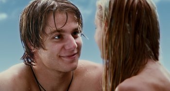 Movie still from “Aquamarine” (2006), directed by Elizabeth Allen Rosenbaum – A man and a woman in the water together; Close Up shot, Over the shoulder angle