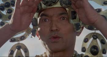 Movie still from “Arabian Nights” (1974), directed by Pier Paolo Pasolini – A man's face wearing a helmet; Close Up shot, Low angle