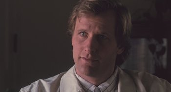 Movie still from “Arachnophobia” (1990), directed by Frank Marshall – A person wearing a white shirt and tie; Close Up shot, Low angle