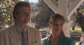 A man and a woman standing next to each other
