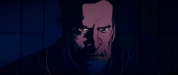 Movie still from “Archenemy” (2020), directed by Adam Egypt Mortimer – A painting of a man's face in a dark room; Extreme Close Up shot, Overhead angle