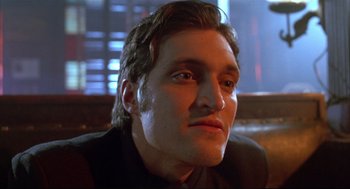 Movie still from “Arizona Dream” (1993), directed by Emir Kusturica – A man's face in a restaurant; Close Up shot, Low angle