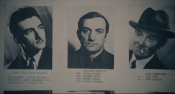 Movie still from “Army of Shadows” (1969), directed by Jean-Pierre Melville – A black and white photo of a man's face; Extreme Close Up shot, High angle