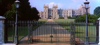 Movie still from “Around the World in 80 Days” (1956), directed by John Farrow – A gate leading to a large castle like building; Extreme Wide shot, High angle