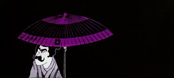Movie still from “Around the World in 80 Days” (1956), directed by John Farrow – A purple umbrella is in front of a black background; Close Up shot, Low angle