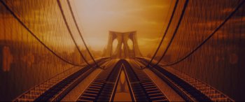Movie still from “Arrival” (2016), directed by Denis Villeneuve – A view of a train track with a bridge in the background; Extreme Wide shot, Low angle
