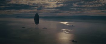 Movie still from “Arrival” (2016), directed by Denis Villeneuve – An image of an egg in the middle of the ocean; Extreme Wide shot, Low angle