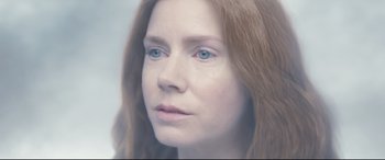 Movie still from “Arrival” (2016), directed by Denis Villeneuve – A person with blue eyes; Close Up shot, High angle