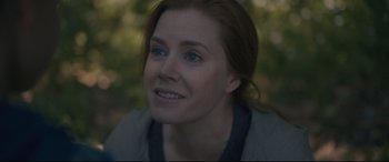 Movie still from “Arrival” (2016), directed by Denis Villeneuve – A person with blue eyes; Close Up shot, Over the shoulder angle