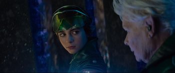 Movie still from “Artemis Fowl” (2020), directed by Kenneth Branagh – A person wearing a helmet; Close Up shot, Over the shoulder angle