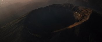 Movie still from “Artemis Fowl” (2020), directed by Kenneth Branagh – A view of a crater in the middle of the night; Extreme Wide shot, High angle