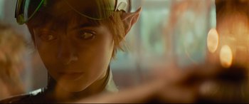 Movie still from “Artemis Fowl” (2020), directed by Kenneth Branagh – A person's face and ears; Extreme Close Up shot, Over the shoulder angle