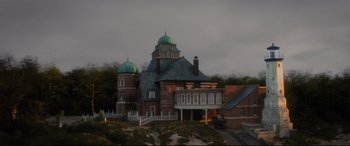 Movie still from “Artemis Fowl” (2020), directed by Kenneth Branagh – A large building with a green dome on top of it; Extreme Wide shot, High angle