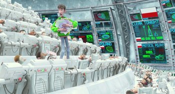 Movie still from “Arthur Christmas” (2011), directed by Barry Cook – A man standing on top of a computer keyboard; Wide shot, Low angle