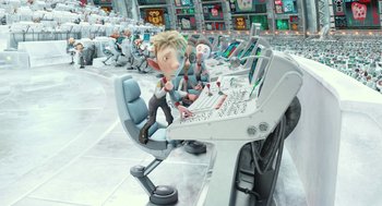 Movie still from “Arthur Christmas” (2011), directed by Barry Cook – A computer desk with a computer on top of it; Wide shot, High angle
