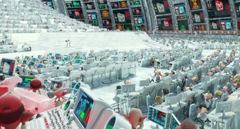Movie still from “Arthur Christmas” (2011), directed by Barry Cook – An audience in an auditorium with a lot of screens; Extreme Wide shot, High angle