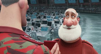 Movie still from “Arthur Christmas” (2011), directed by Barry Cook – An animated character is being interviewed by a person; Close Up shot, Over the shoulder angle