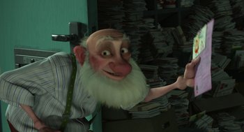 Movie still from “Arthur Christmas” (2011), directed by Barry Cook – An old man with a white beard is smiling for the camera; Medium shot, Low angle