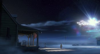 Movie still from “Arthur Christmas” (2011), directed by Barry Cook – A person standing in the middle of a field at night; Extreme Wide shot, Low angle