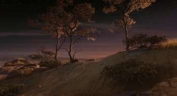 Movie still from “Arthur Christmas” (2011), directed by Barry Cook – A view of trees on a hillside at night; Extreme Wide shot, High angle