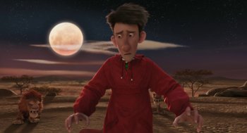 Movie still from “Arthur Christmas” (2011), directed by Barry Cook – An animated character in a red shirt is in the desert; Medium shot, Low angle