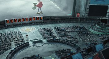 Movie still from “Arthur Christmas” (2011), directed by Barry Cook – An overhead view of a computer room with a computer monitor; Extreme Wide shot, High angle