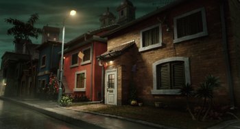 Movie still from “Arthur Christmas” (2011), directed by Barry Cook – A night scene of a street corner with a building and street lights; Extreme Wide shot, High angle