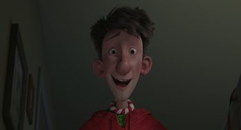 Movie still from “Arthur Christmas” (2011), directed by Barry Cook – A cartoon of a boy with a candy cane necklace; Close Up shot, High angle