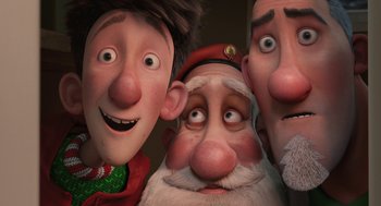 Movie still from “Arthur Christmas” (2011), directed by Barry Cook – A group of three people that are standing next to each other; Close Up shot, Low angle