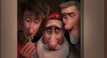 Movie still from “Arthur Christmas” (2011), directed by Barry Cook – A group of three people standing next to each other; Close Up shot, High angle