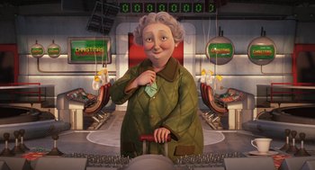 Movie still from “Arthur Christmas” (2011), directed by Barry Cook – An old woman standing in front of a computer screen; Medium shot, High angle