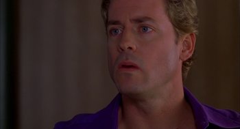Movie still from “As Good as It Gets” (1997), directed by James L. Brooks – A person with blue eyes; Close Up shot, Over the shoulder angle
