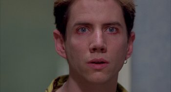 Movie still from “As Good as It Gets” (1997), directed by James L. Brooks – A person with blue eyes; Close Up shot, Over the shoulder angle