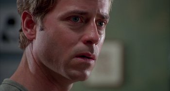 Movie still from “As Good as It Gets” (1997), directed by James L. Brooks – A man's face looking at the camera; Close Up shot, Over the shoulder angle
