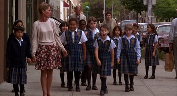 Movie still from “As Good as It Gets” (1997), directed by James L. Brooks – A group of school children walking down a street; Wide shot, High angle